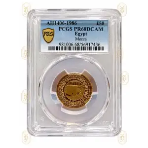 This 1986 (AH1406) Egypt 50 Pounds gold coin, certified PR68DCAM by PCGS (cert. 56917436), features the sacred Kaaba in Mecca. Struck in gold with deep cameo proof finish, it is a superb example of modern Egyptian commemorative coinage. A prestigious piec
